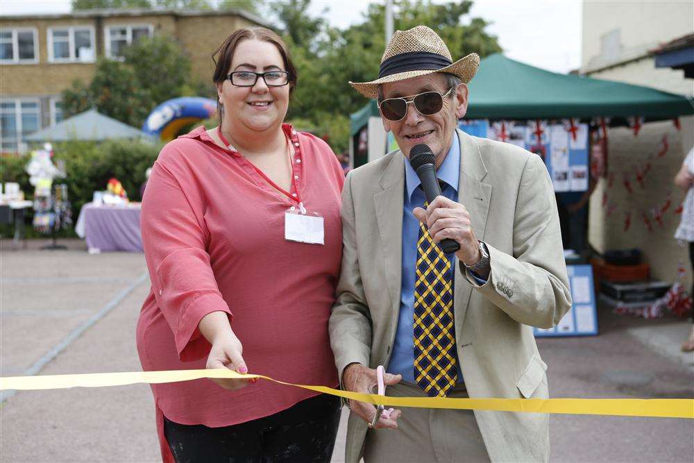 Organiser Shannon Mitchell opens the fete with youth worker Ray Featherstone
