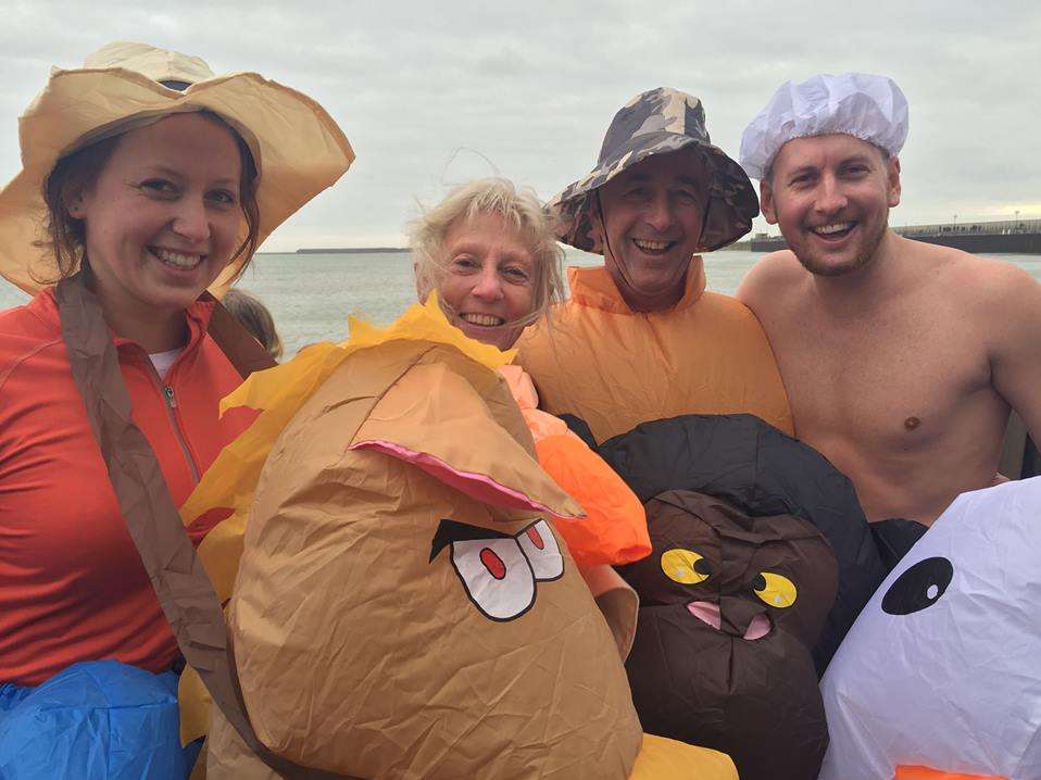 The Moore family donning inflatable animal costumes