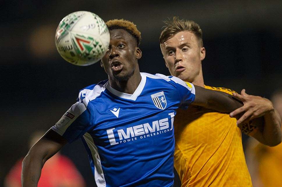 Mikael Ndjoli has eyes on the ball for Gillingham against Newport County Picture: Ady Kerry (15196140)