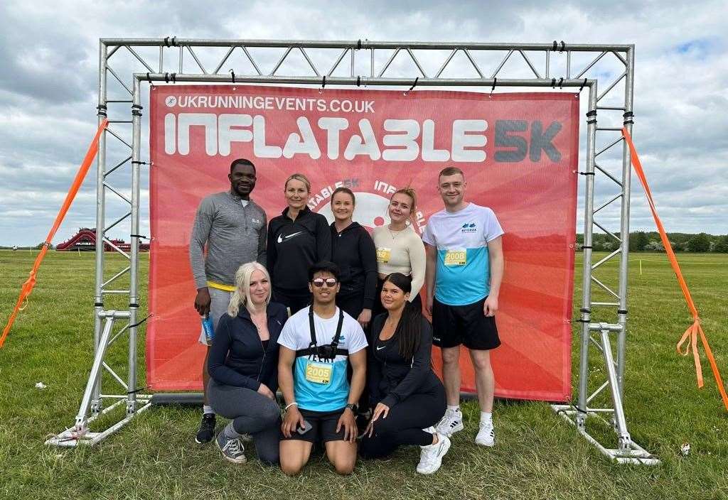 The team at Wards took part in the Inflatable 5k race to raise money for their 2023 partner, the Children’s Trust. Picture: Wards