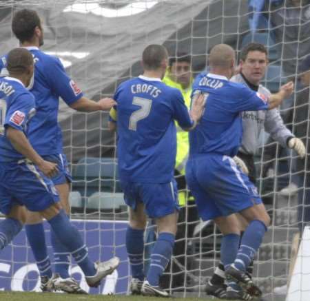 Gills player rush to congratulate Derek Stillie on his penalty save