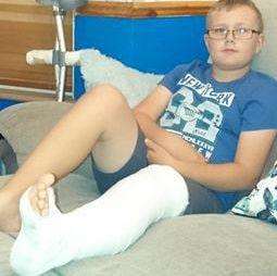 Injured Damien, 10, was left in plaster and still suffers pain
