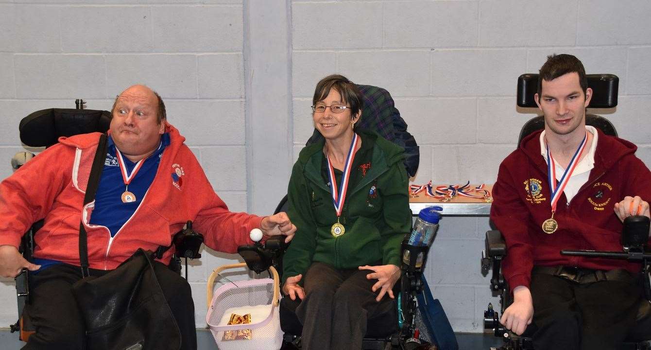 BC1 + BC2 singles champion Amy Lewington is flanked by Owen Porter of Prince Arthur Boccia Club in Gillingham and Herne Bay Boccia Club's Joe Sutton