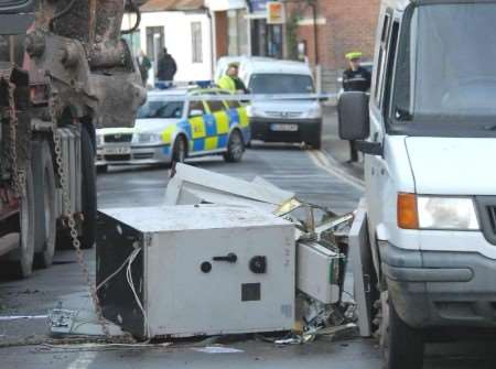 The remains of the safe wedged between the van and low loader. Picture: BARRY DUFFIELD