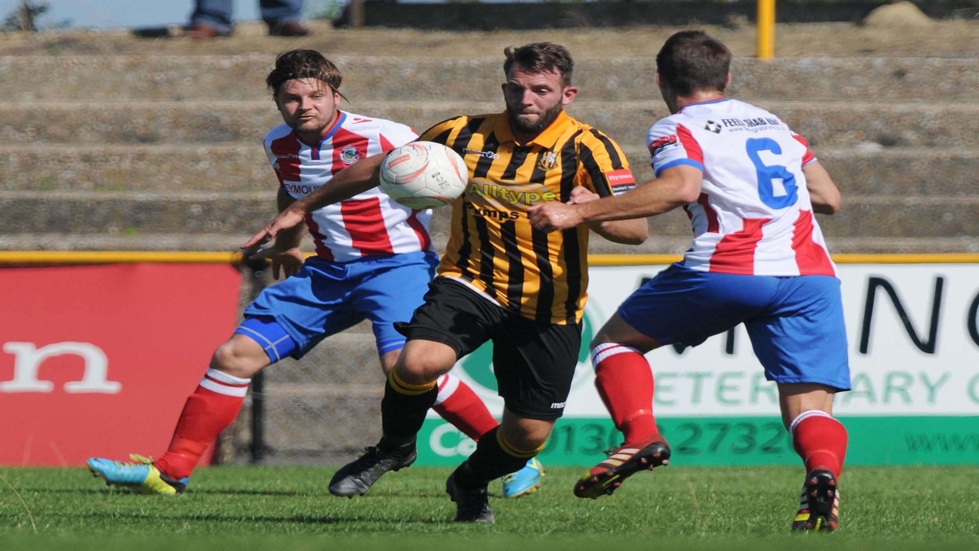 Josh Vincent on the ball for Folkestone against Dorking Wanderers on Saturday Picture: Wayne McCabe