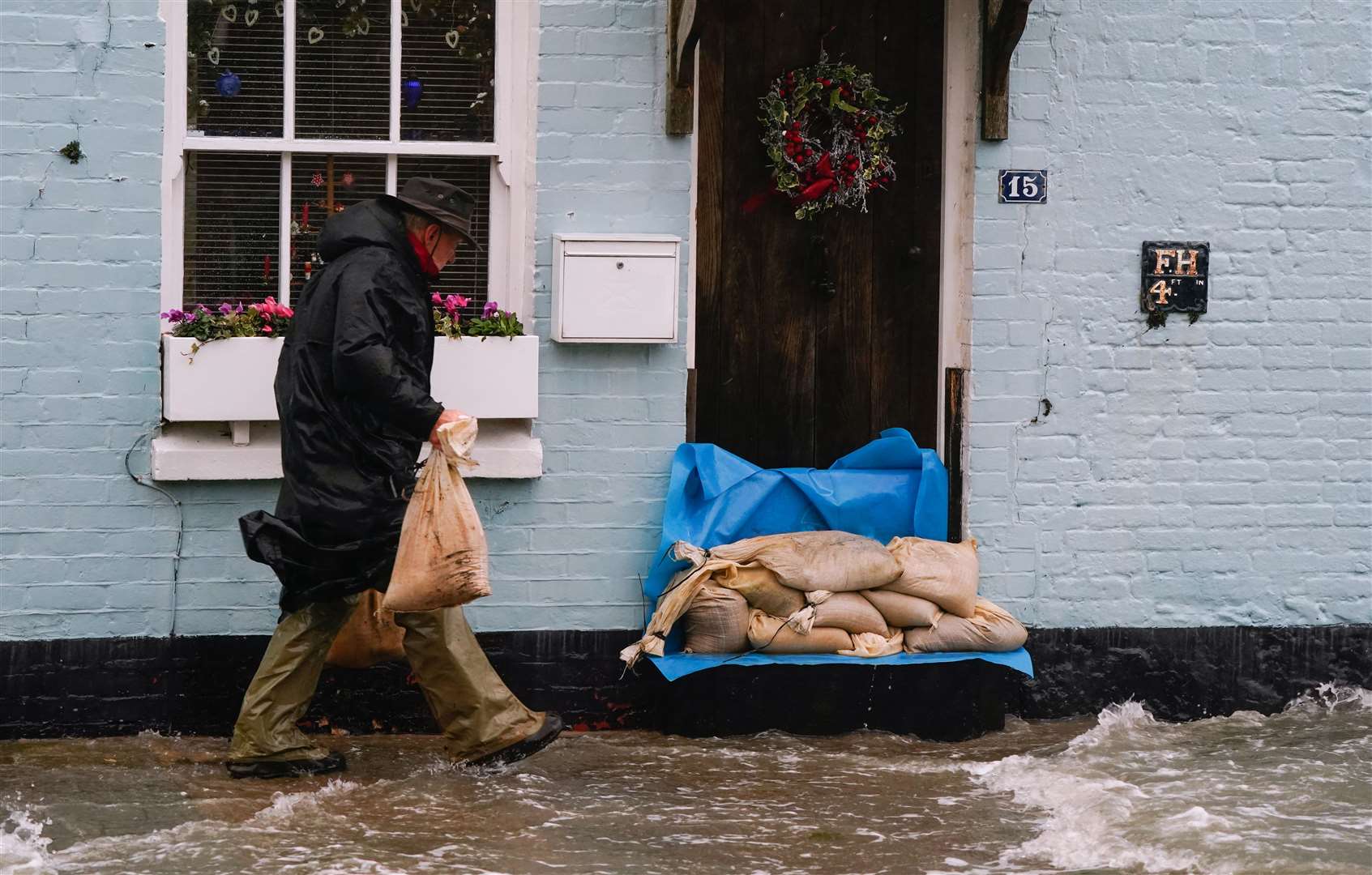 Sandbags outside a property in Langstone, Hampshire (Andrew Matthews/PA)