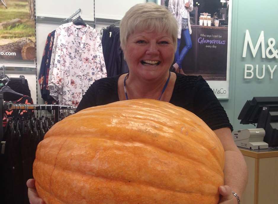 Sales advisor Kerry Bates with the pumpkin.