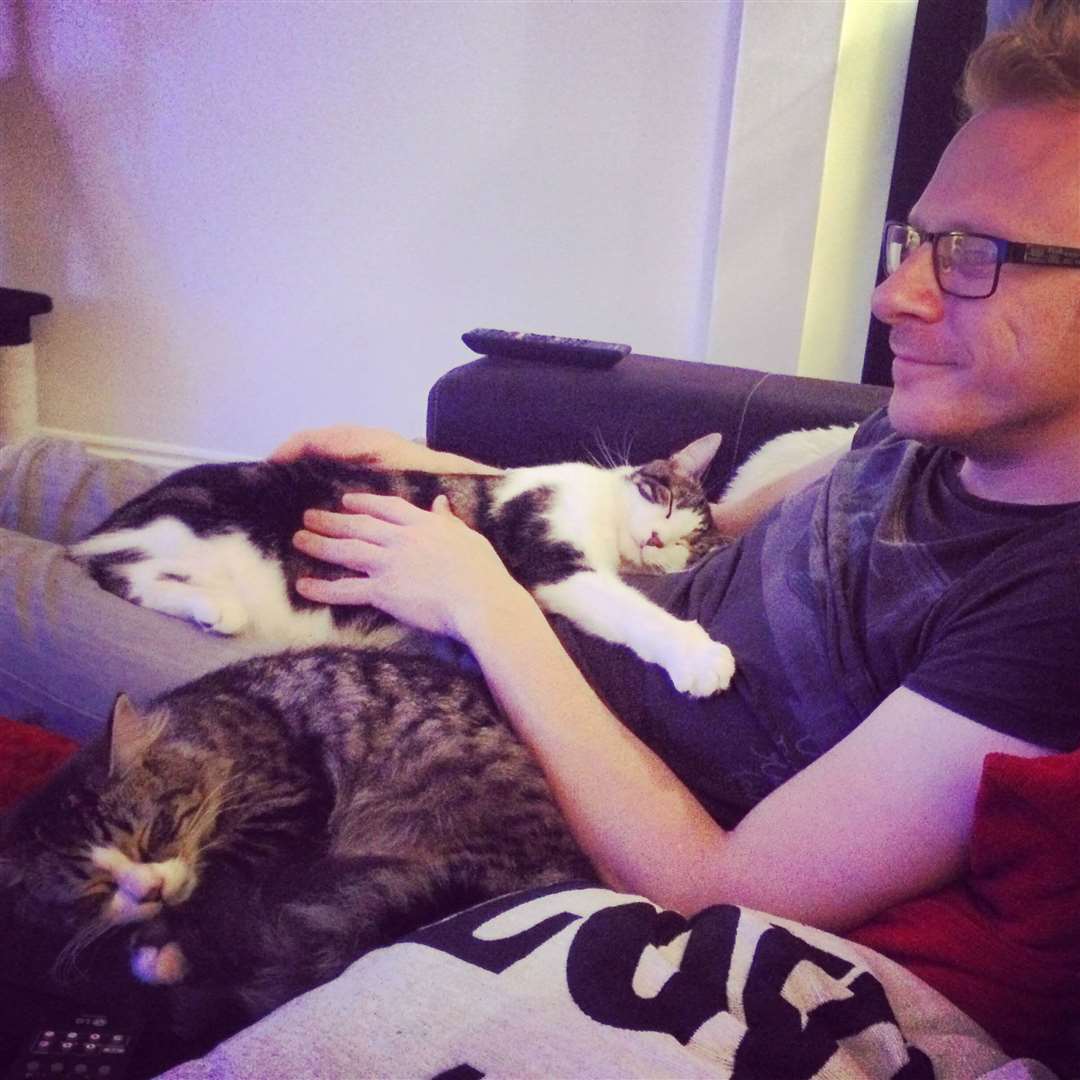 Lloyd relaxes with the cats