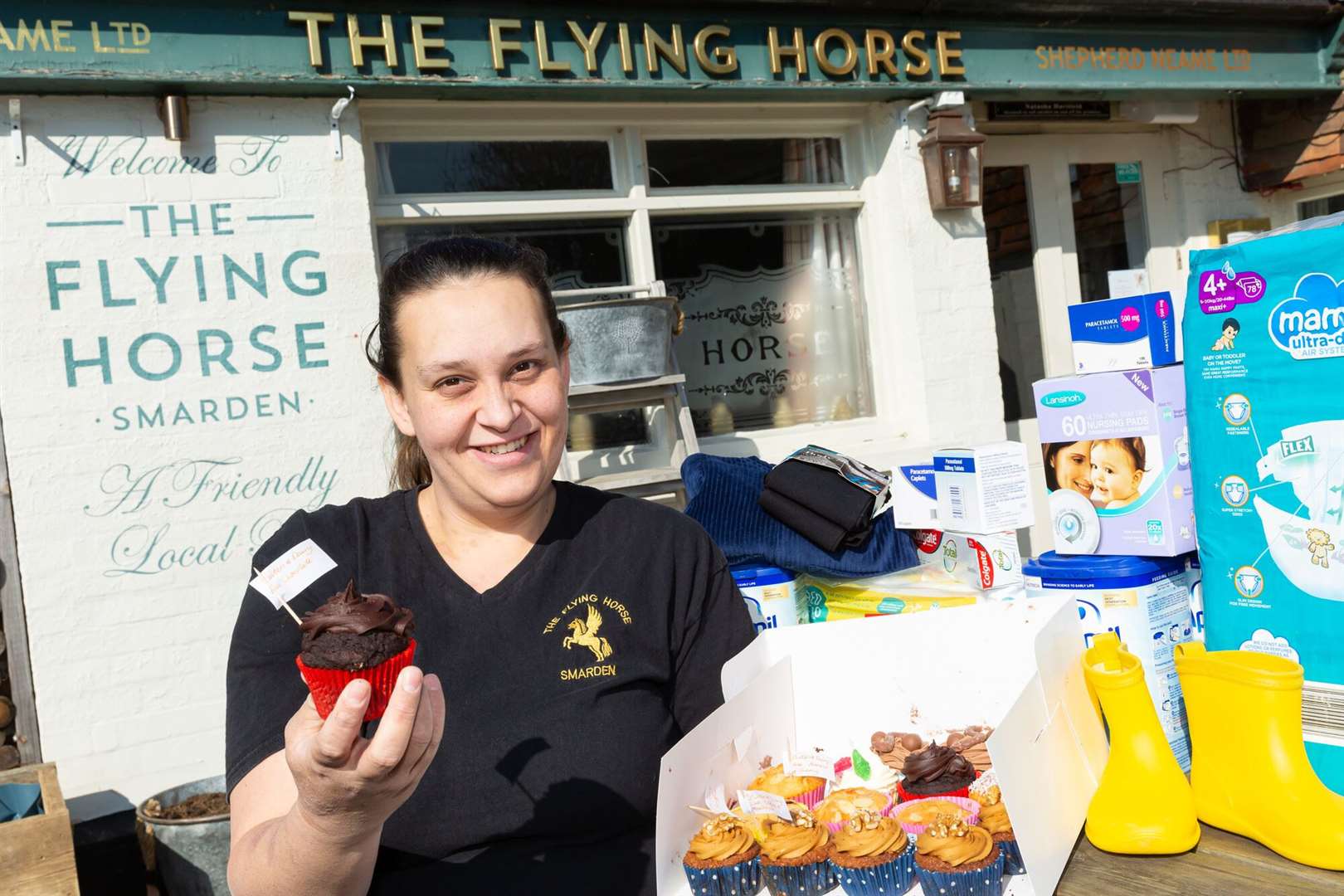 Landlady Natasha Hartfield and her sister raised £600 for Ukraine by selling cupcakes. Picture: Shepherd Neame