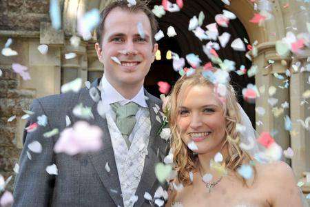 Sam and Adrian Bowers on their wedding day. Picture: SWNS