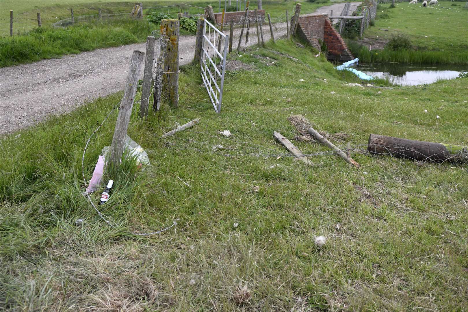 The fence that the car went through during the crash. Picture: Barry Goodwin