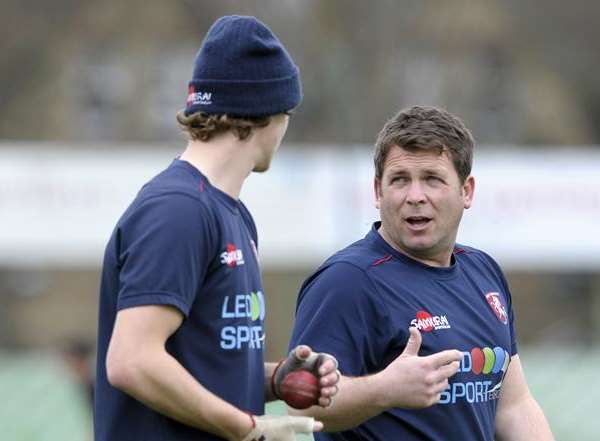 Matt Walker in discussion with Kent captain Sam Northeast Picture: Barry Goodwin