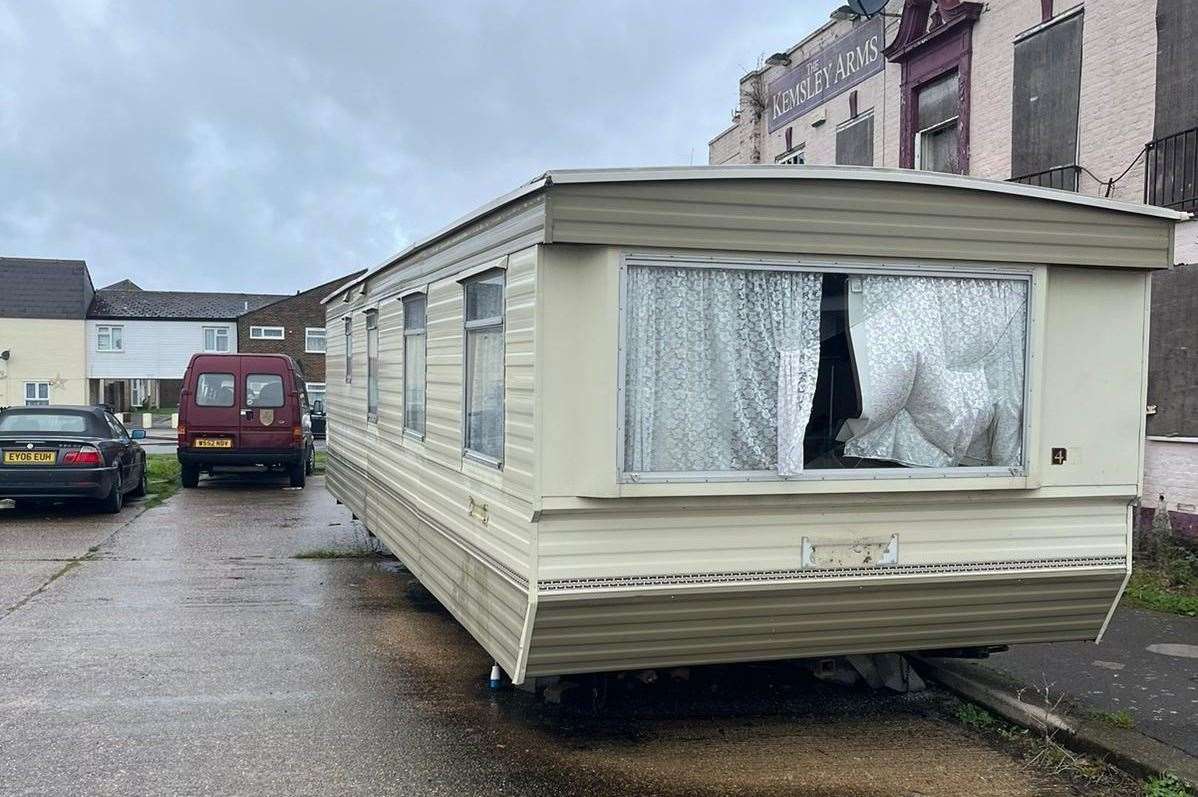 The caravan with its windows smashed outside the Kemsley Arms in Ridham Avenue, Kemsley