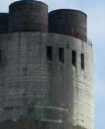 Greenpeace protesters scale the chimney at Kingsnorth in October 2007