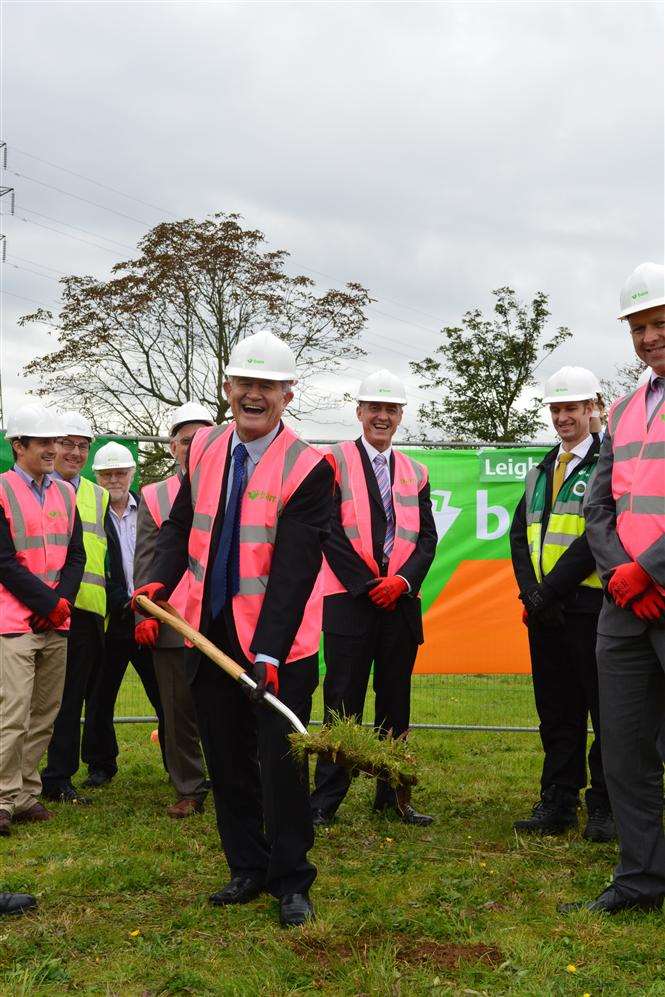 Leigh Trust CEO Frank Green getting stuck in with the turf cutting for the new Leigh UTC.