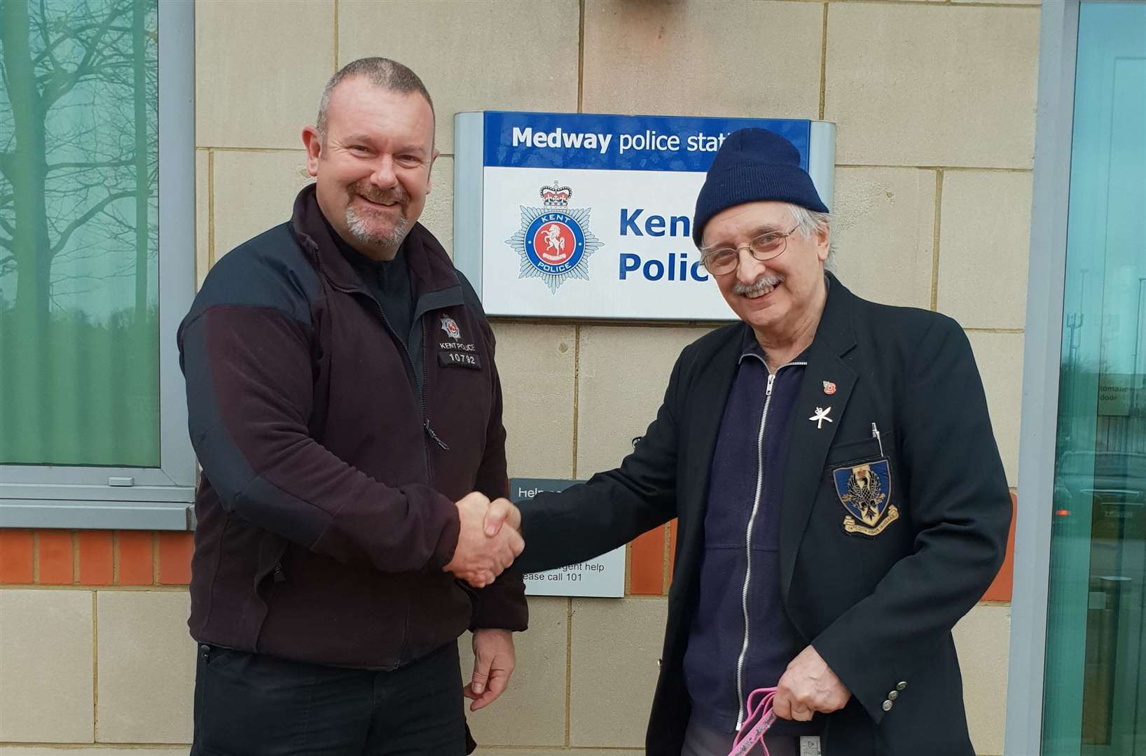 PC Martyn Tulk returning Nala to Adrian Gleadhill. Picture: Kent Police