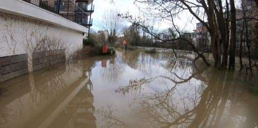 A footpath between Maidstone and Tovil flooded with water reaching 'waist height'. Picture: Matt Perry