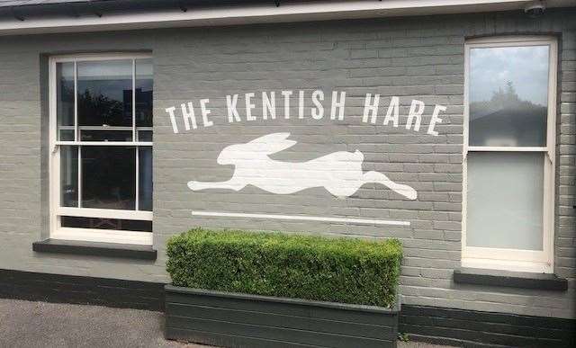 The Kentish Hare logo featured on the side of the pub looks as if it’s cleared this box hedge with ease