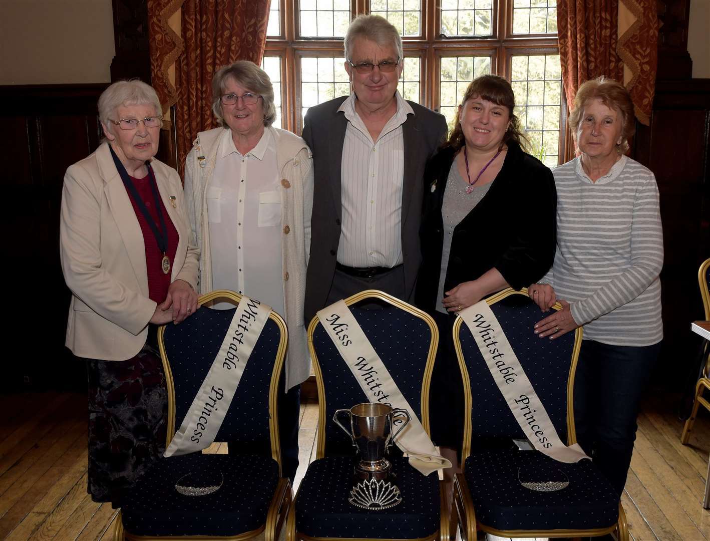 Estelle Short (second right) pictured with the Whitstable Carnival committee and three empty chairs when no girls entered the court selection in 2018
