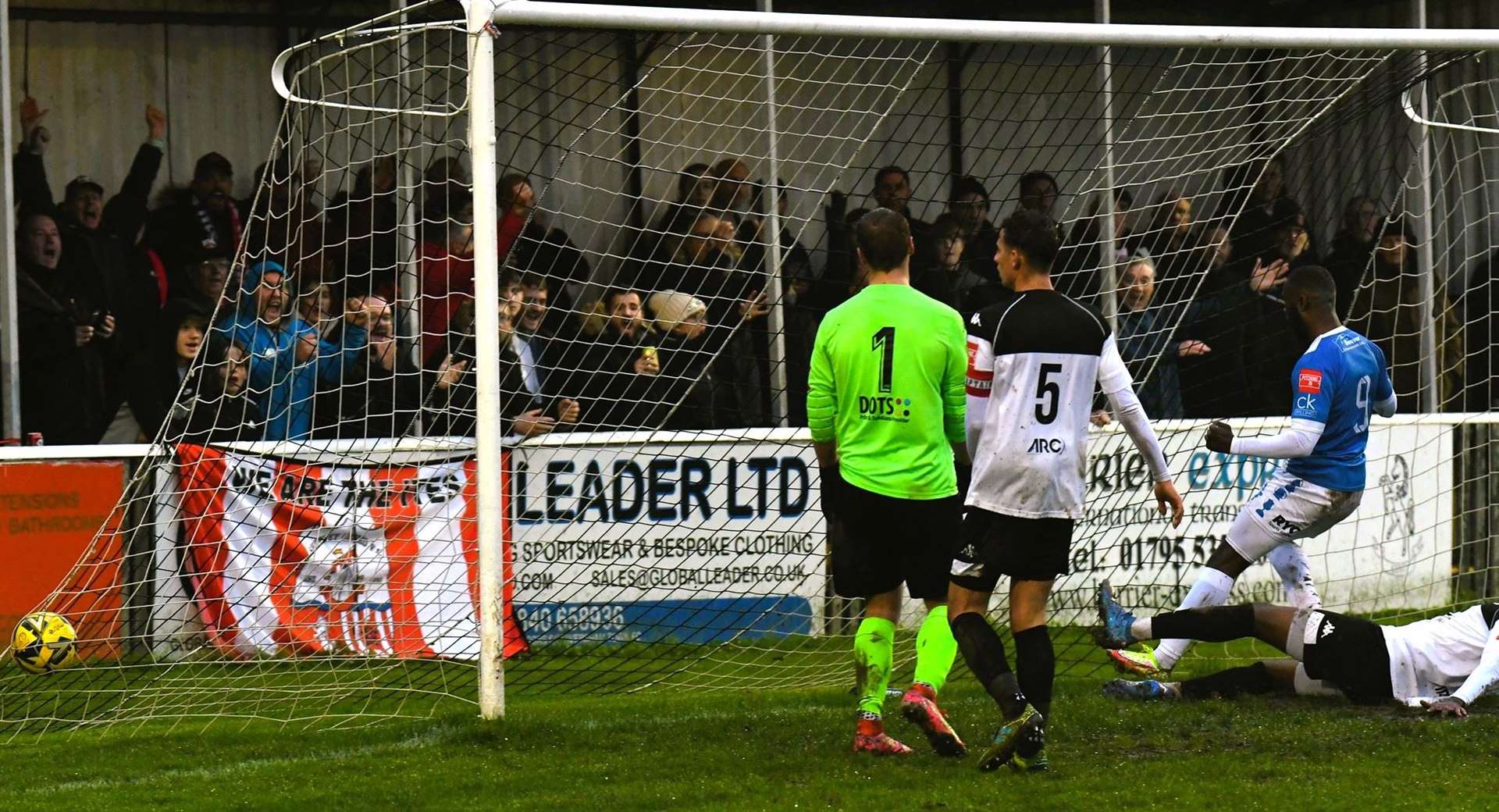 Warren Mfula celebrates as George Bentley and Connor Wilkins look on in disappointment. Picture: Marc Richards