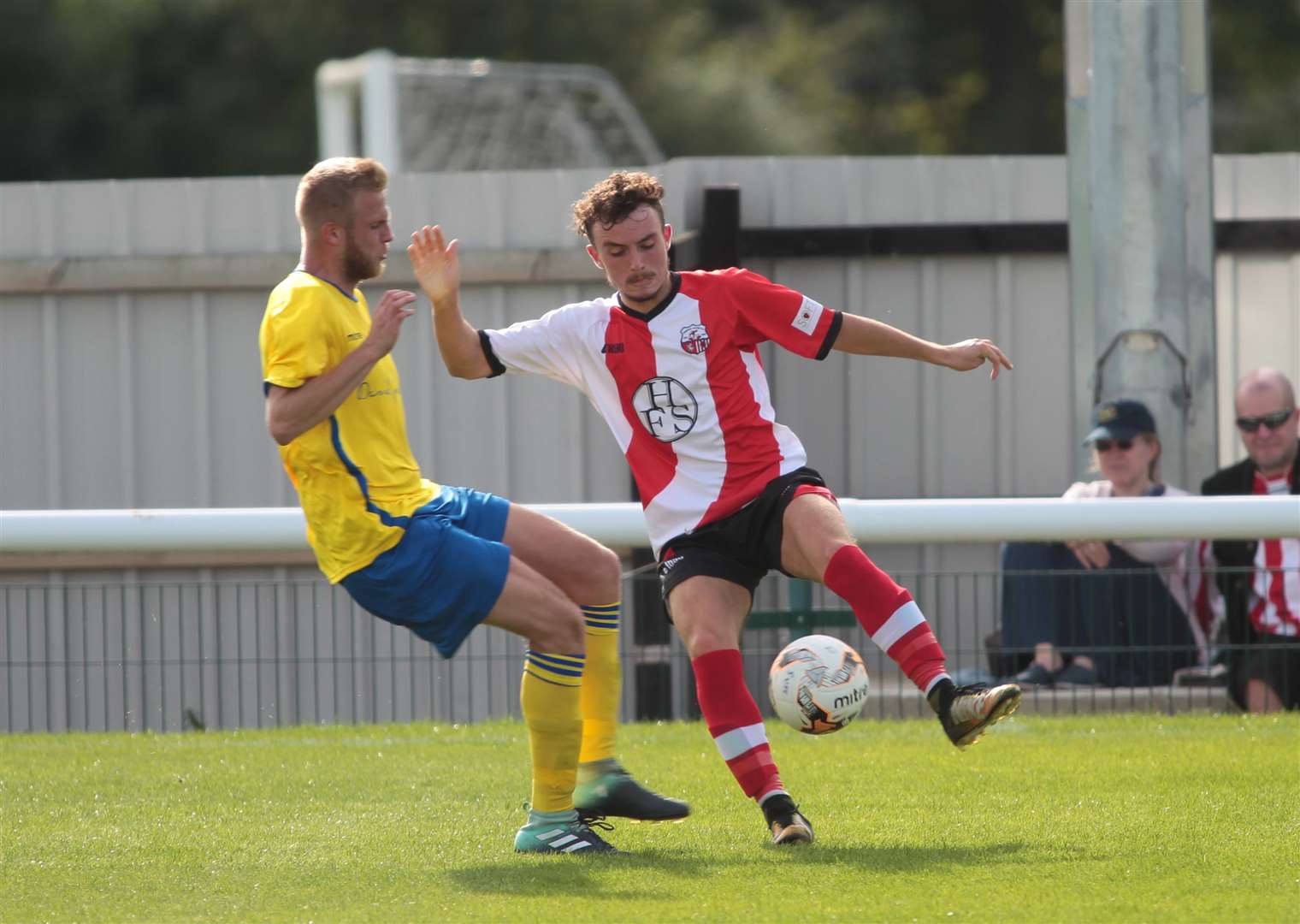 Sheppey (red and white) beat Seaford 5-3 in the second qualifying round Picture: John Westhrop