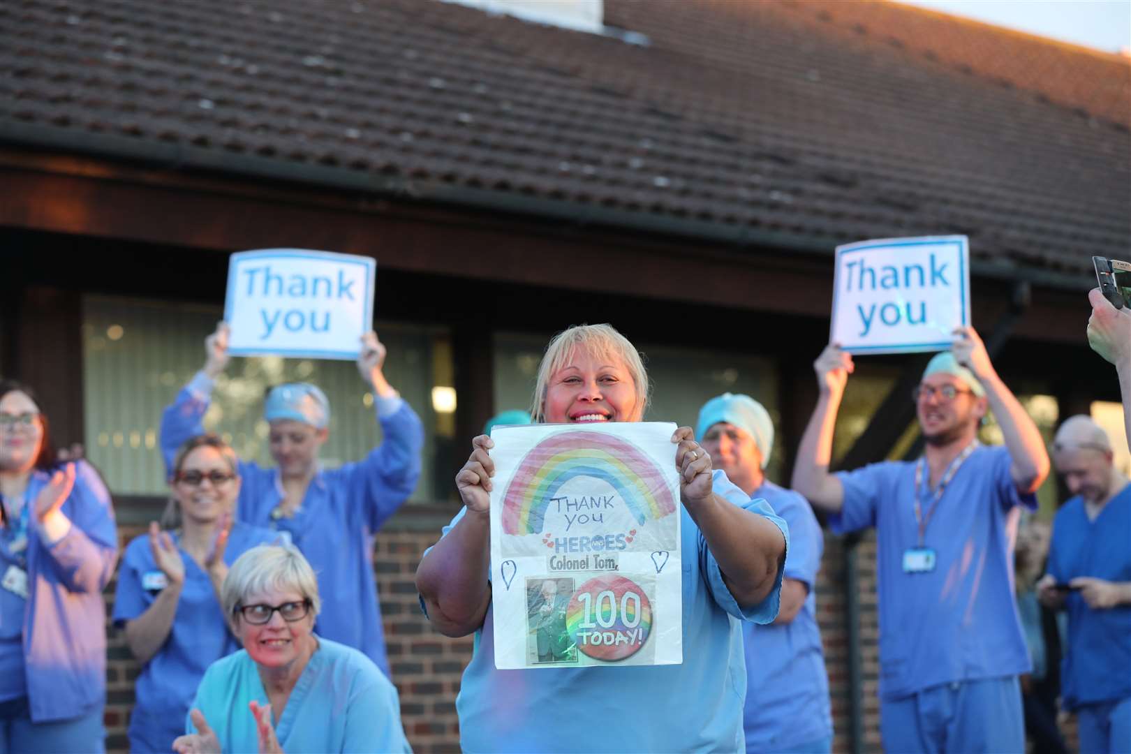 The nationwide clap for carers continued, with medical staff outside the William Harvey Hospital in Ashford, Kent, joining in (Gareth Fuller/PA)