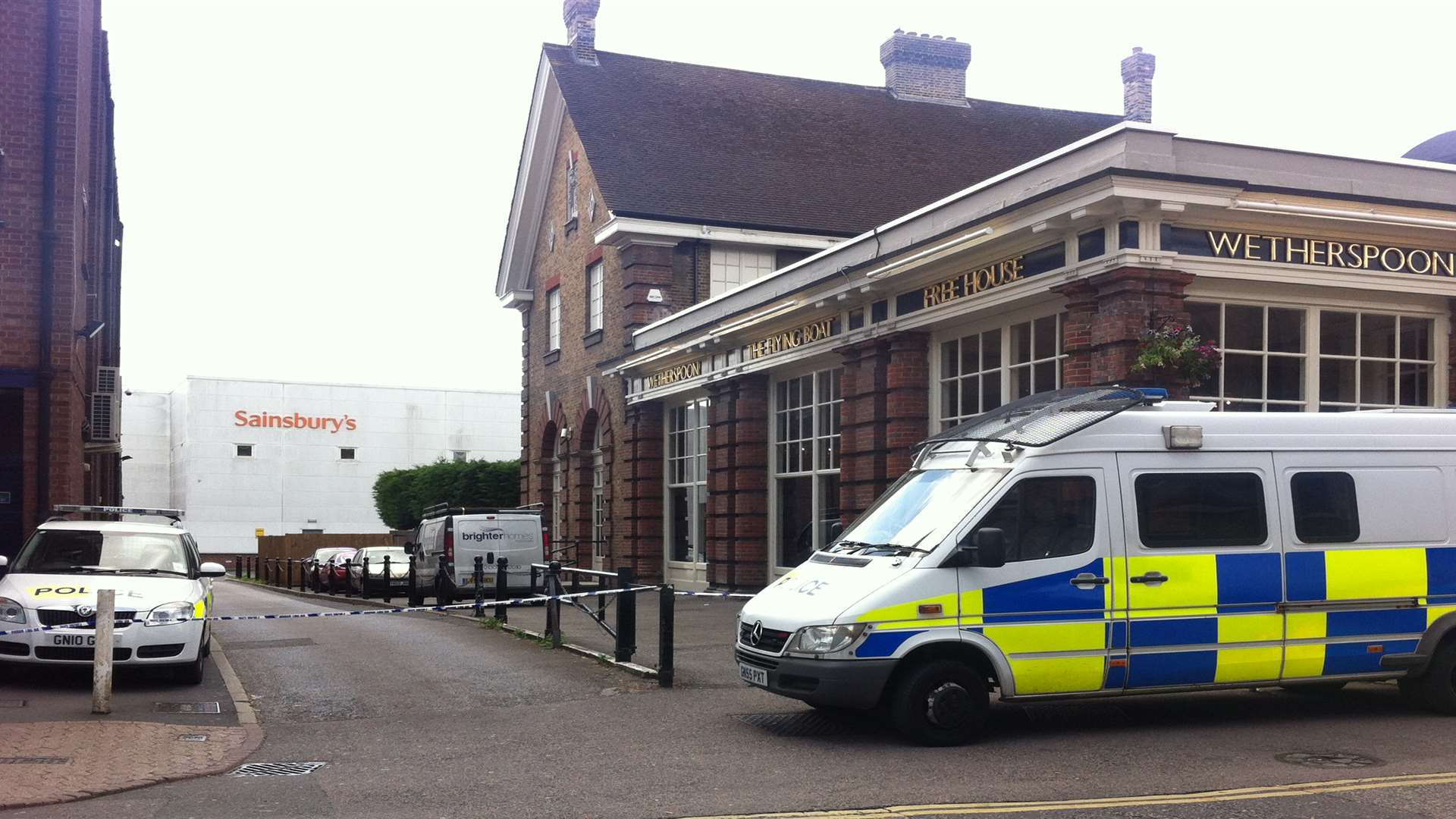 A police cordon in Dartford's Spital Street after a man's body was found
