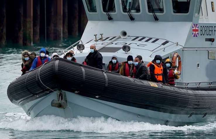 People brought in to Dover on board a Border Force vessel following a small boat incident in the Channel. Picture: Gareth Fuller/PA