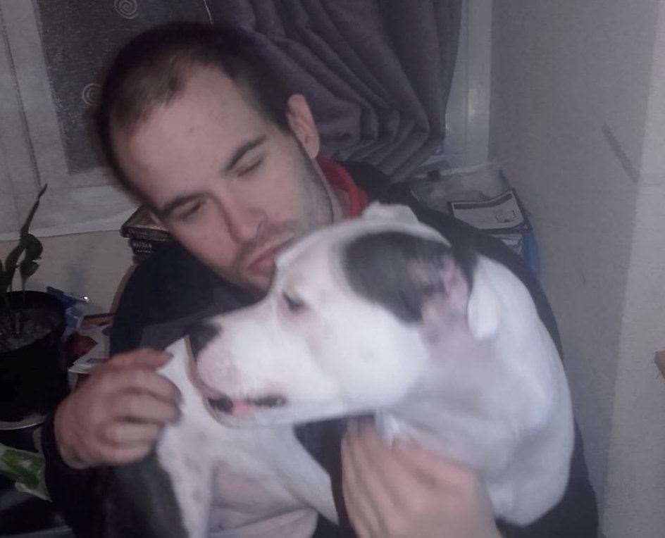 Christopher Connolly helped Denise look after her dog. Picture: SWNS