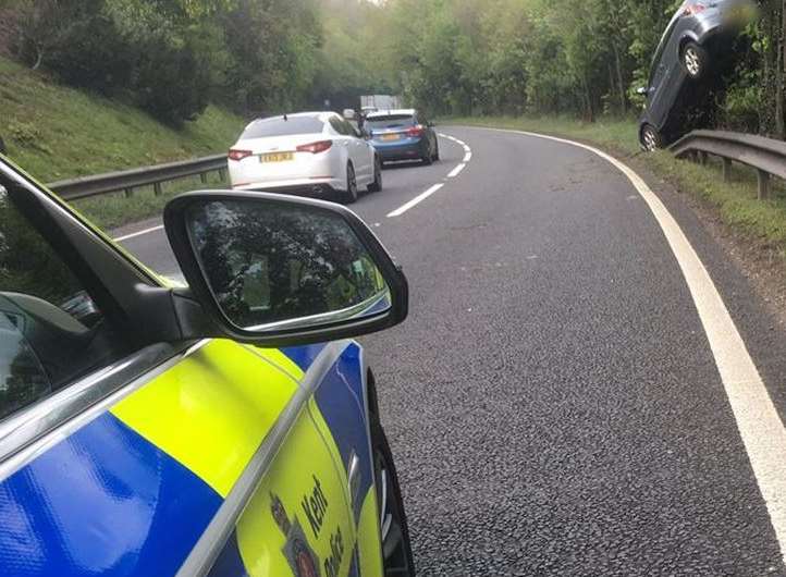 The car came to a stop up a tree on the A249. Picture: Kent Police Roads