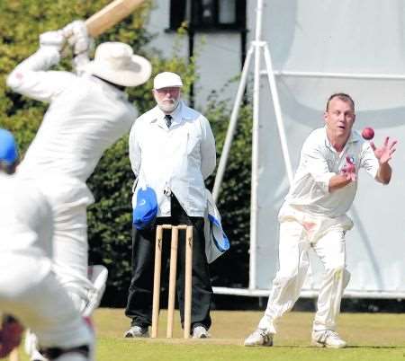 Offham’s Phil Blakeburn fields off his own bowling during Saturday’s Division 5 Kent League game against Old Wilsonians