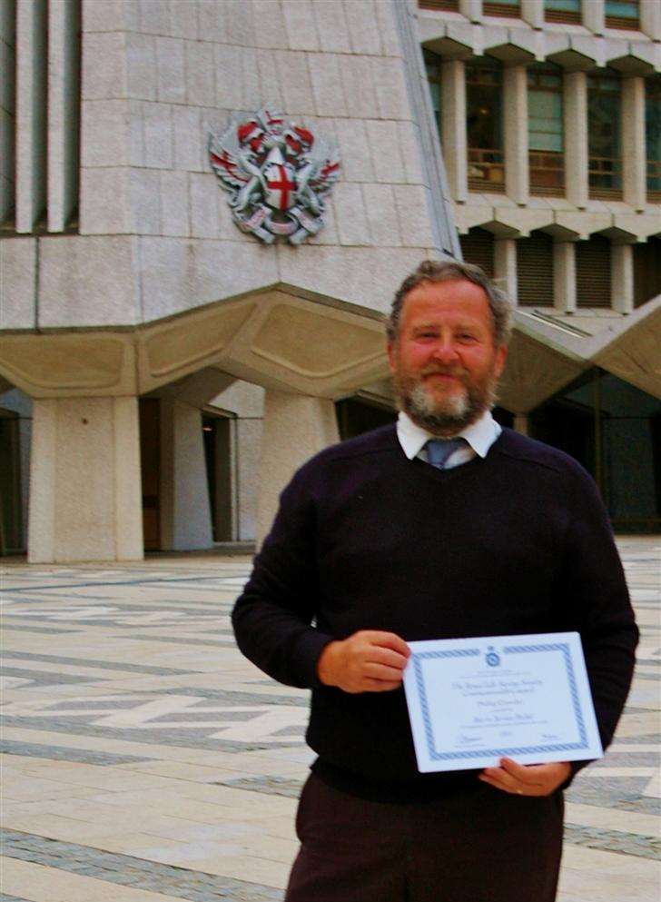 Phil Crowder with his award