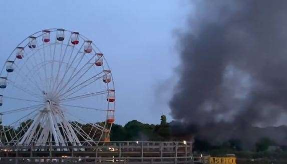 Plumes of black smoke were seen rising across Dreamland after a fire at a car park nearby (11538567)