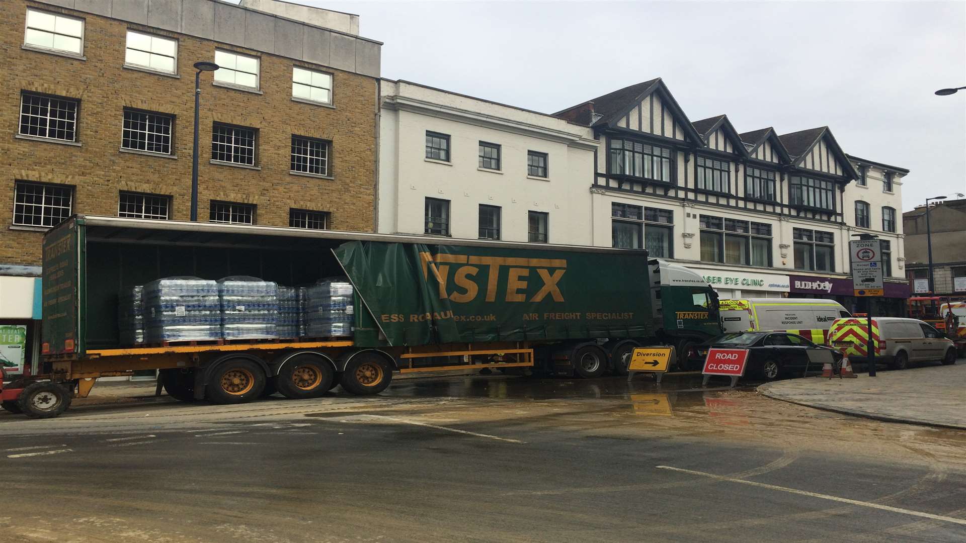 A lorry with pallets of water on was parked at the end of Mill Street