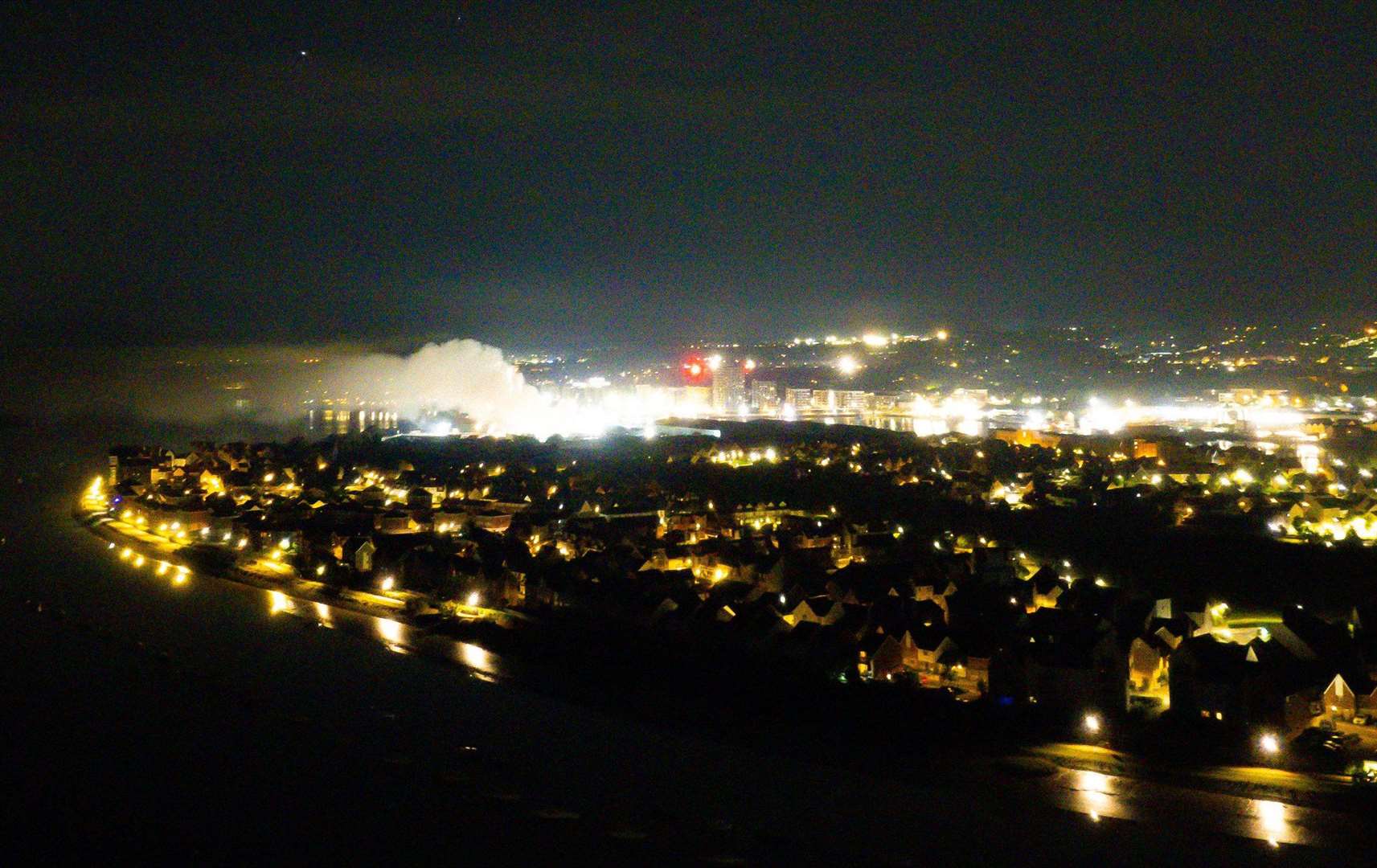 Smoke can be seen billowing from Chatham Docks as crews tackle a large fire. Picture: @CameraLeon