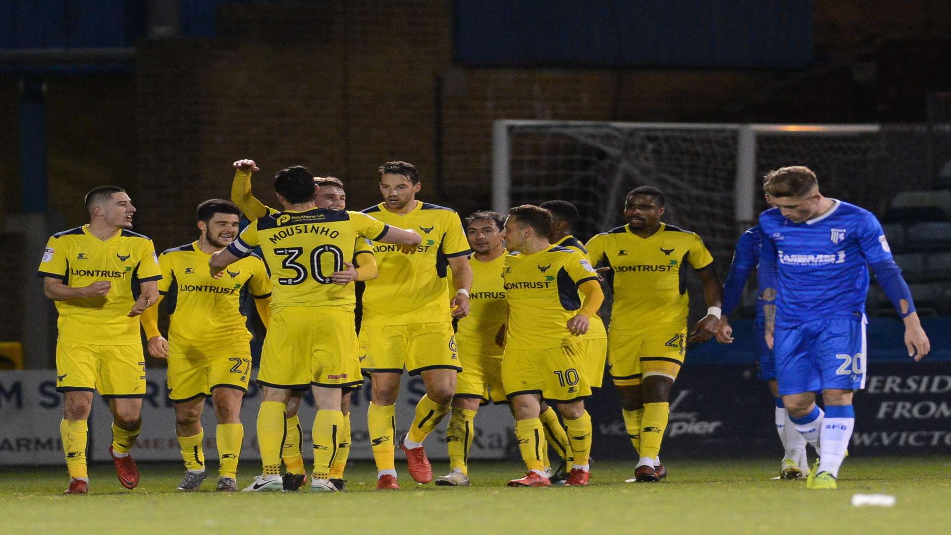 Last-gasp woe for Gills as Oxford celebrate their injury-time winner Picture: Gary Browne