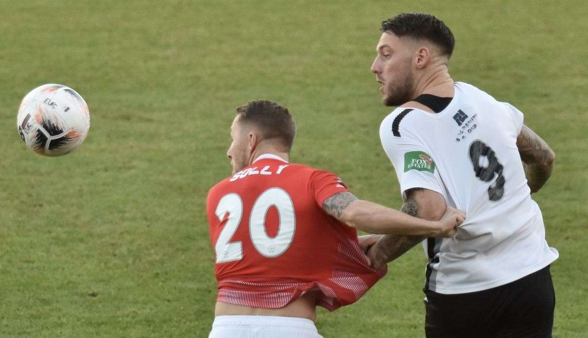Dartford's Alex Wall tussles with Fleet skipper Chris Solly before the first goal of the game on Boxing Day. Picture: Ed Miller/EUFC