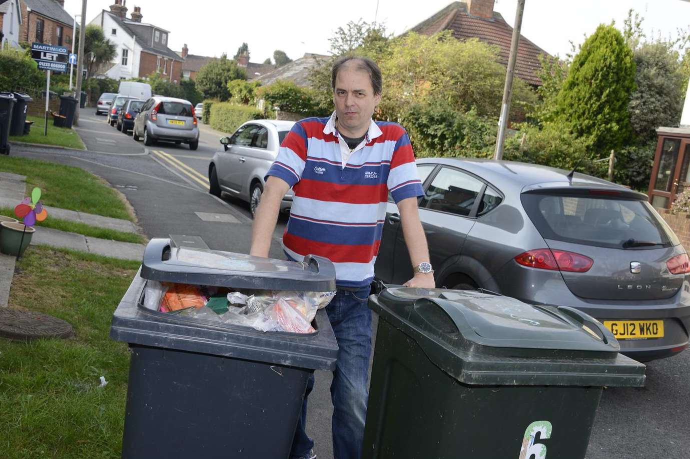 The refuse bins in the close are already full