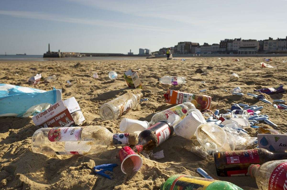 Bottles and nitrous oxide canisters on Margate beach. Picture: Tim Stubbings