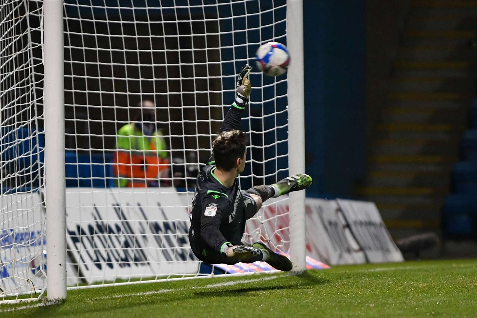 Lincoln's Jorge Grant beats Jack Bonham from the penalty spot to make it 2-0 against Gillingham Picture: Keith Gillard