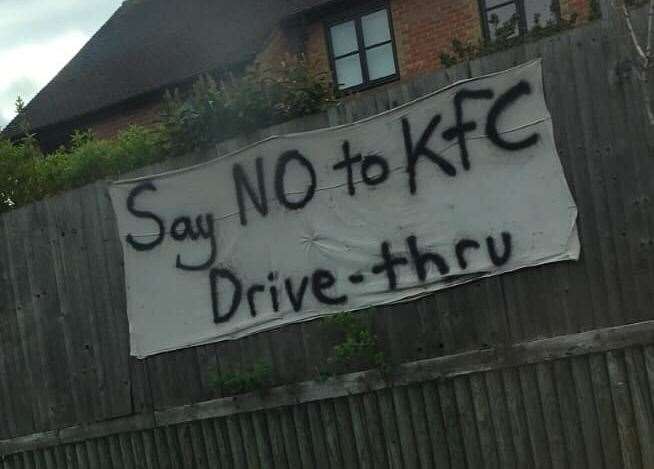 There are signs for and against a KFC in Snodland. Credit: Katie Rose