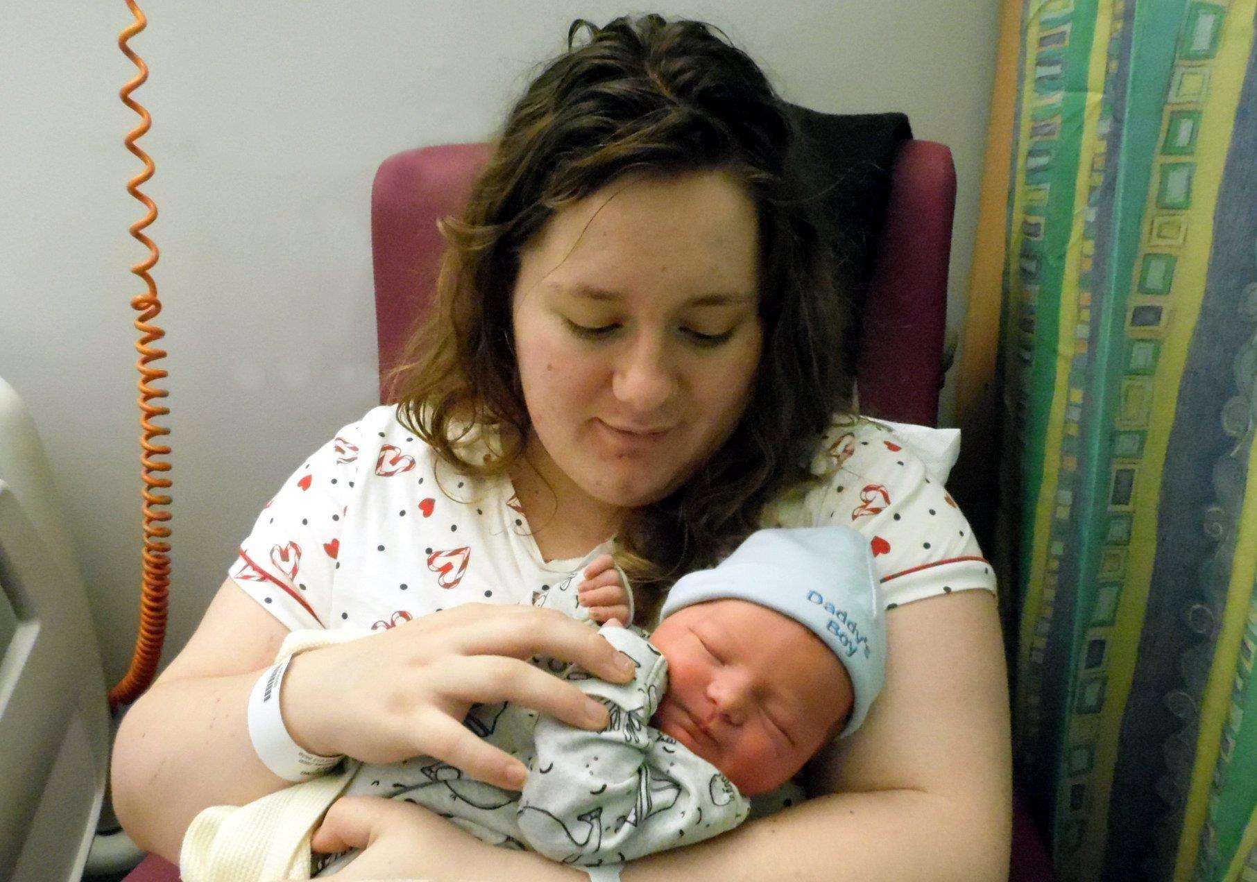 Baby Freddie was born at 16:26 on the 1st Jan weighing 8lb 15oz Feddie is pictured with Mum Grace. (6314039)