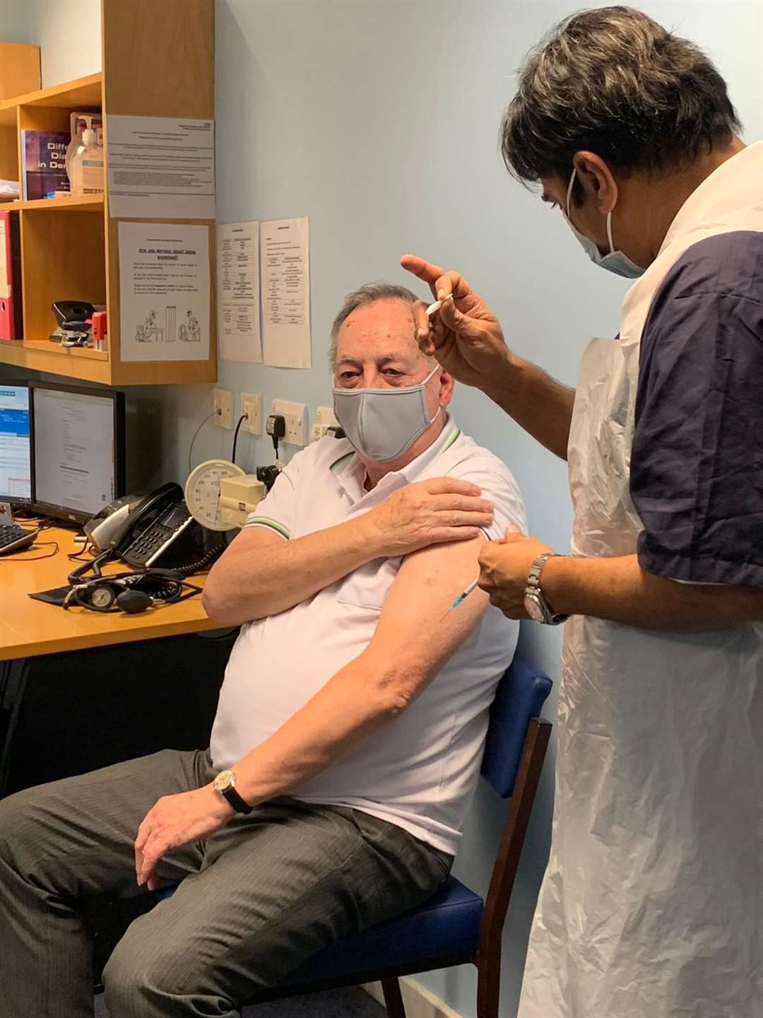 Frederick Hall, 80, from Swanscombe, receiving one of the first vaccines at Swanscombe Health Centre. Picture: NHS Kent and Medway Clinical Commissioning Group