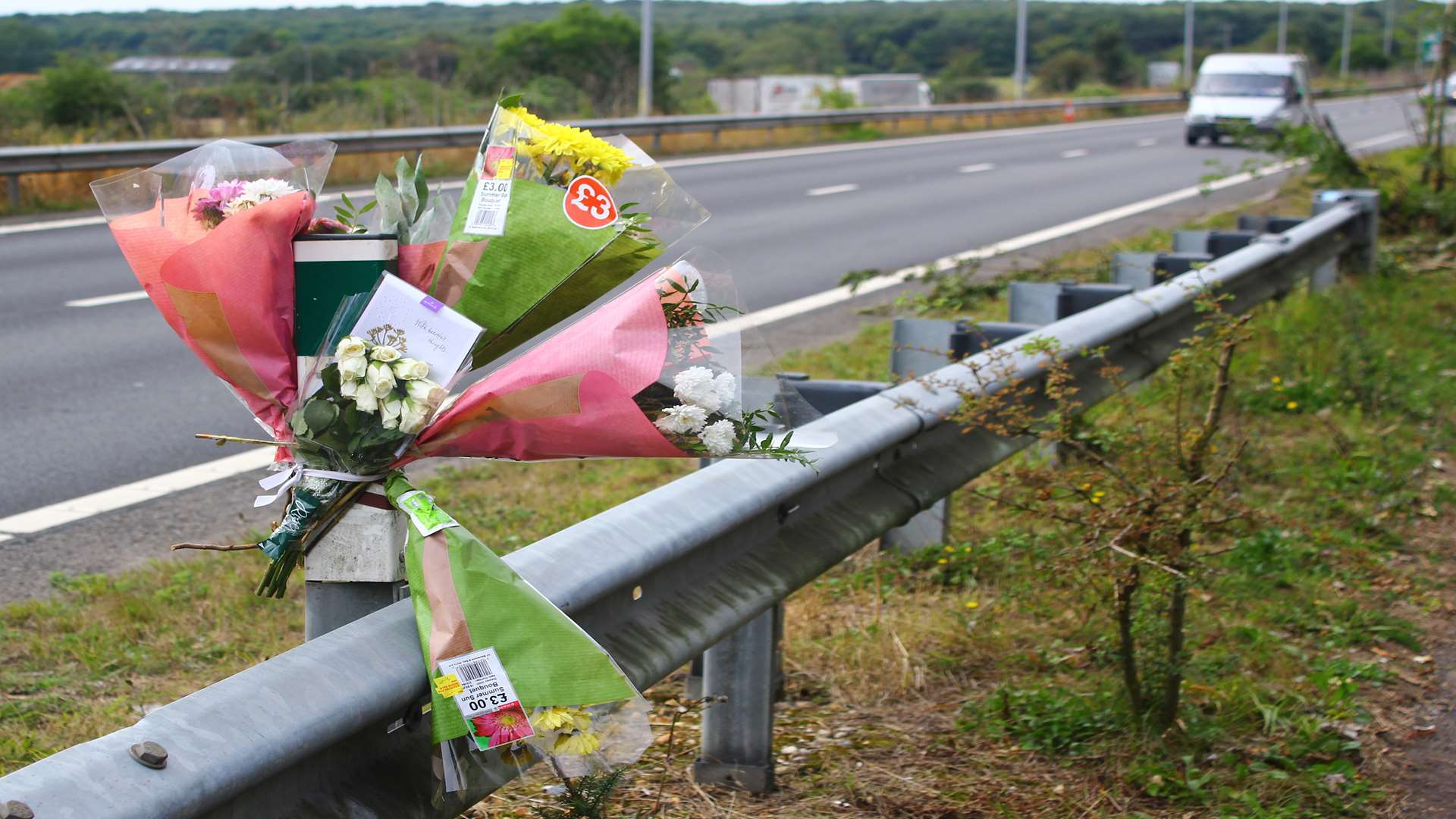 Flowers left at the scene of a crash on the A2