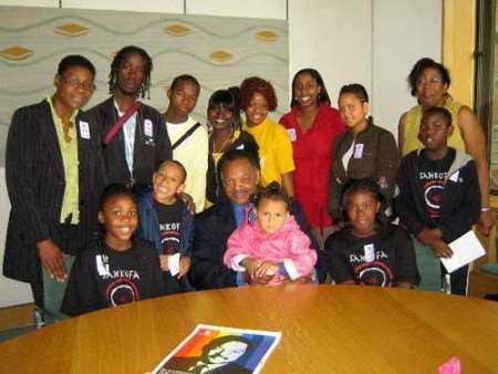 The children with the Reverend Jesse Jackson. Picture courtesy Hurricane Entertainments