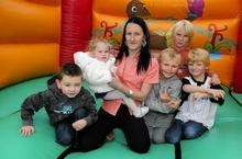 Jo Murphy, Dante's mum, with kids on the bouncy castle.