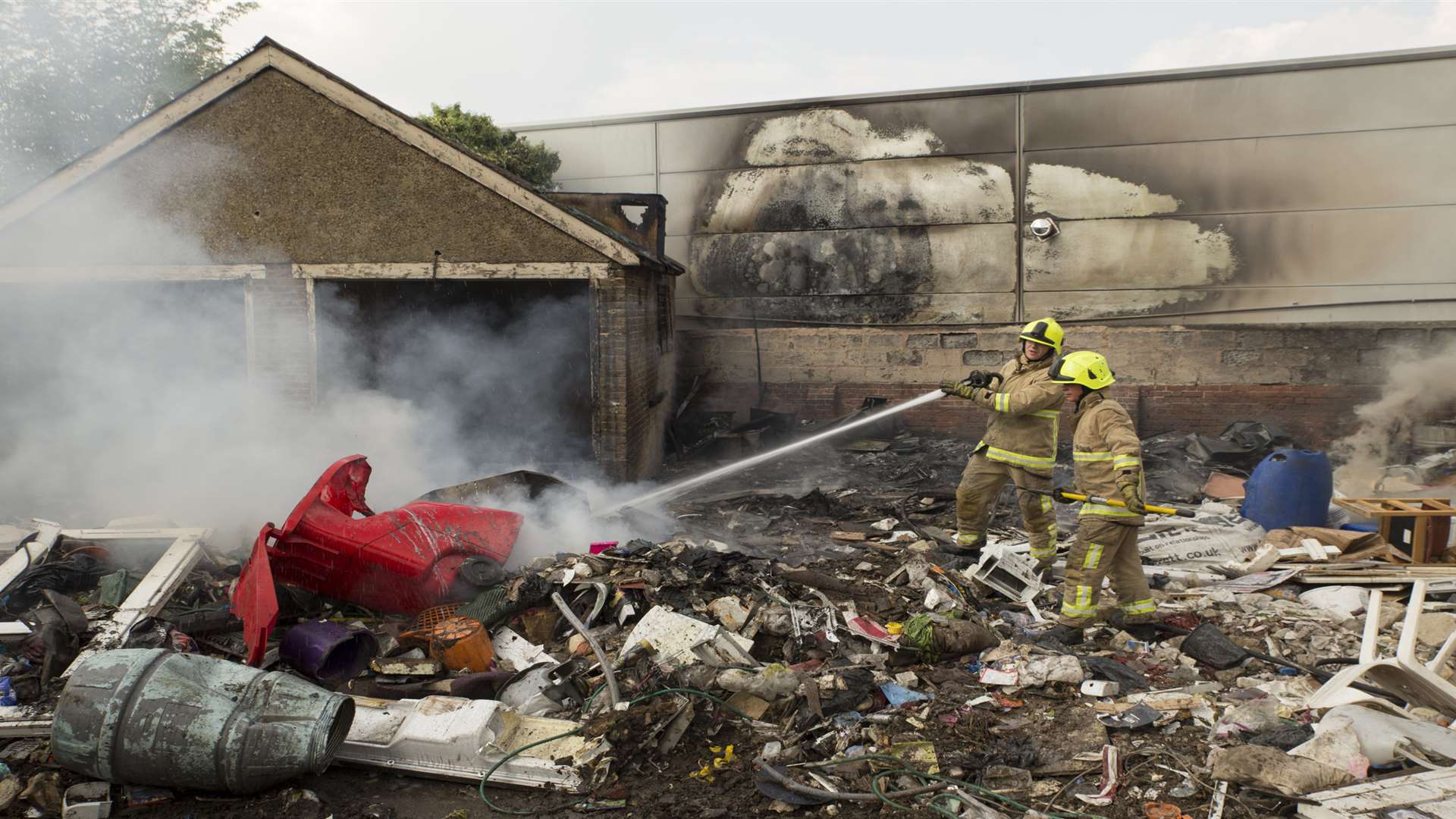 Fire crews dampen down the scene. Pictures: Kent Fire and Rescue Service