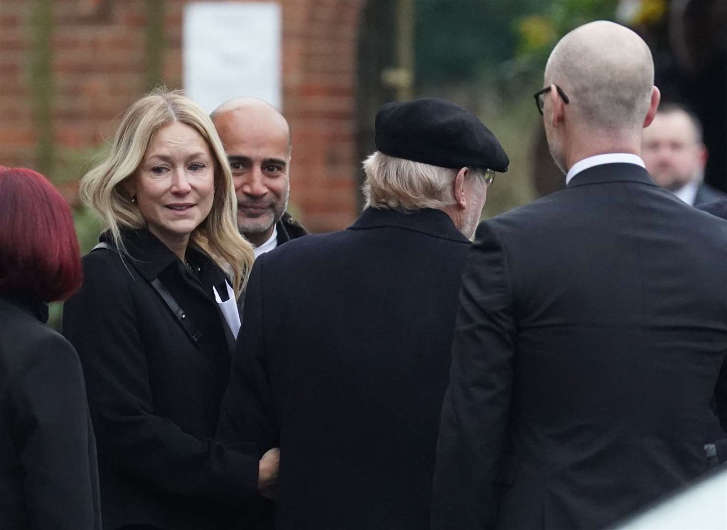 Rachel Kinnock, Lord Neil Kinnock and Stephen Kinnock, right, arrive for the service (Stefan Rousseau/PA)