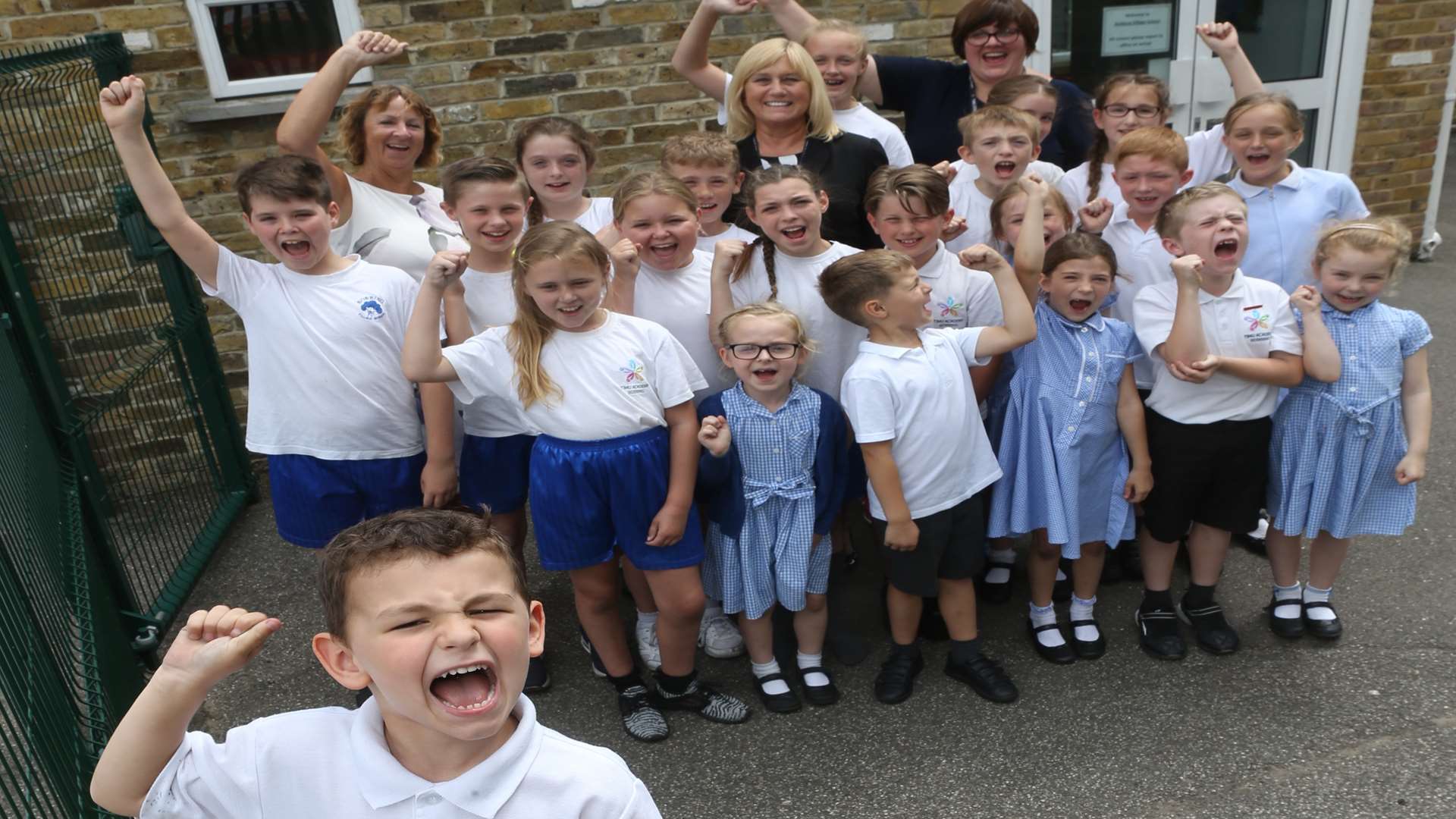 From left, Hadyn, five, with Mrs Ware, Executive Principal, Mrs Hudson, Principal and Mrs Stewart, Assistant Head celebrate with some of the children from Bobbing Village School for receiving an Outstanding Ofsted Report in all areas.