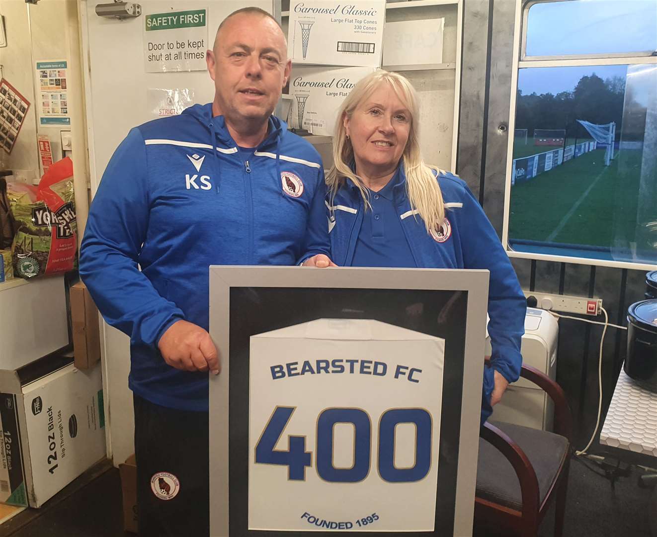 Husband-and-wife partnership Kevin Stevens and Lesley Stevens with a framed "400" shirt which was presented to Kevin last Saturday